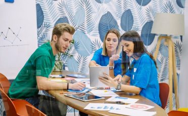 creative-team-having-discussion-social-media-application_23-2147847492